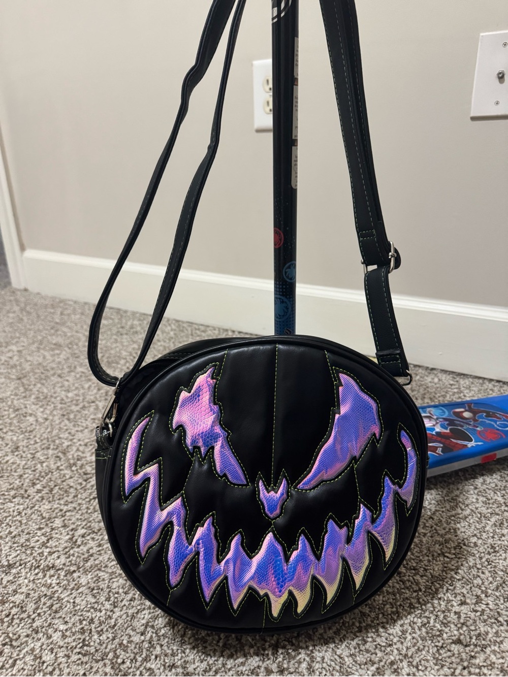 Pumpkin Kult - Black Round Crossbody Bag with Iridescent Purple Accent two faced